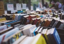Colorful books displayed at market