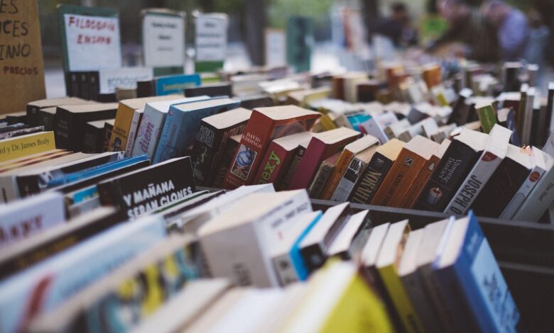 Colorful books displayed at market